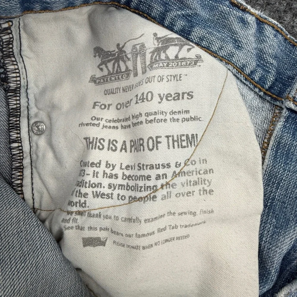 Levis 569‎ Loose Straight Fit Jeans Mens 34x34 Light Wash Distressed Blue Denim